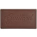 A brown Guittard rectangular chocolate bar with the word "Guittard" on it.
