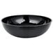 A black Cambro round ribbed serving bowl.