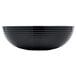 A close up of a black Cambro Camwear round ribbed bowl.