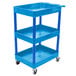 A blue three shelf Luxor plastic utility cart with wheels.