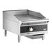 A Vollrath stainless steel countertop griddle with black handles.