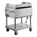 A stainless steel Backyard Pro grill cart with wheels.