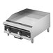 A silver Vollrath medium-duty countertop griddle with black manual controls.