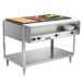 A Vollrath ServeWell electric hot food table with three food pans on it.