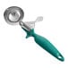 A silver and green Choice thumb press scooper.