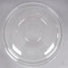 A clear plastic dome lid on a white surface.