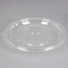 A clear plastic bowl with a clear plastic dome lid on it.