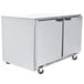 A Beverage-Air stainless steel undercounter freezer with two doors on wheels.