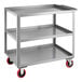 A gray metal Lavex utility cart with three shelves.