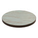 An American Tables & Seating round wooden table top with a light blue and Yangon wood grain finish.