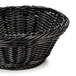 A black polyweave round bread basket with a handle.