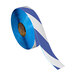 A roll of Superior Mark blue and white striped safety tape.