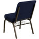 A navy blue church chair with gold dots and a gold metal frame.