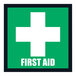 A green and white sign with the words "First Aid" and a white cross.