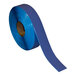 A roll of blue Superior Mark safety tape.