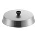A silver round aluminum basting cover with a black handle.