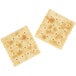 Two Zesta Unsalted Tops Saltine Crackers on a white background.