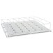 A white metal shelf with metal bars and four white metal trays on it.