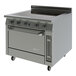 A large stainless steel Garland electric induction range with a top convection oven.