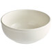 An Acopa ivory stoneware nappie bowl with a rolled edge on a white surface.