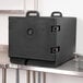 A black Cambro insulated tray carrier on a metal shelf.