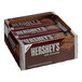 A box of HERSHEY'S King Size Milk Chocolate Bars on a counter.