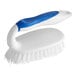 A white and blue Lavex iron scrub brush with a handle.