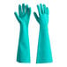 A pair of green unlined Lavex Nitrile gloves.