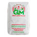 A white bag of Great Lakes Milling yellow corn flour with red and green text and logo.