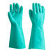 A pair of green rubber gloves with a flock lining.