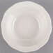 A CAC ivory china bowl with a scalloped edge on a white background.