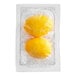 A plastic package containing two yellow hard-cooked eggs.