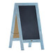 A Flash Furniture Canterbury vintage robin blue wood A-frame chalkboard with a white background.