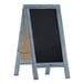 A Flash Furniture Canterbury vintage blue wood A-frame chalkboard with a black chalkboard.