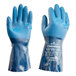 A pair of blue Showa dishwashing gloves with a blue glove on the left.