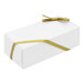 A white Empress candy box with gold ribbon on top.