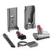 A Dyson V11 cordless stick vacuum with various accessories and tools.