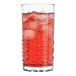 A Libbey Oracle drinking glass with red liquid and ice.