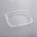 A clear Pactiv plastic container lid on a white surface.