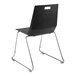 A National Public Seating black polypropylene chair with chrome legs.