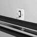 A close-up of the metal door handle on a Turbo Air M3 Series reach-in freezer.