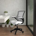 A Flash Furniture white mesh office chair with black arms and wheels.