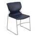 A blue Flash Furniture stacking chair with a metal frame.