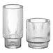 Two Acopa clear glass tumblers with a ribbed rim.