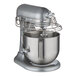 A silver KitchenAid mixer with a metal bowl.