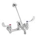 A silver Waterloo wall-mounted mop sink faucet with wrist blade handles.
