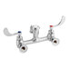 A chrome Waterloo wall-mounted mop sink faucet with wrist blade handles.