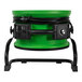 A green and black XPOWER professional axial fan with black cords and switches on a stand.