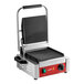 An Avantco commercial panini grill with red and black handles.