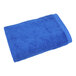 A blue 1888 Mills bath sheet towel.